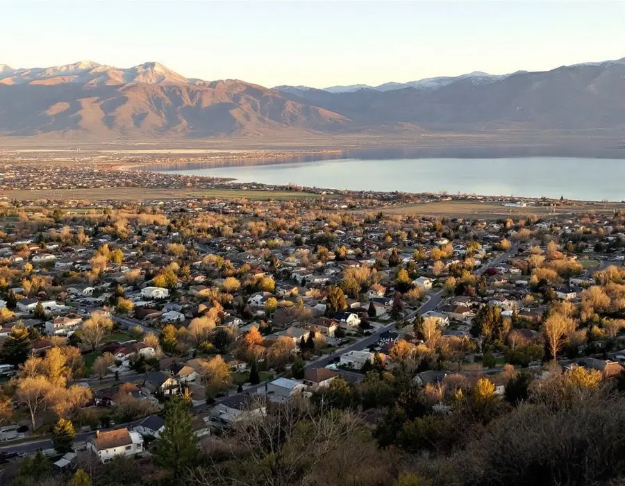 View across Davis County rooftops toward the Great Salt Lake from the bench
