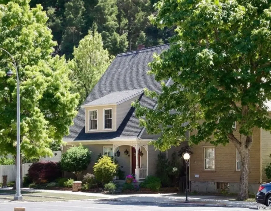Narrow-lot Avenues-style home with a steep roof in Salt Lake City