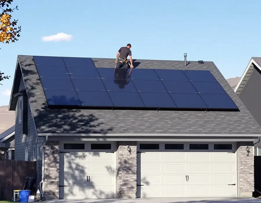 Solar array reinstalled in even rows on a brand-new shingle roof